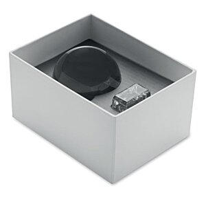 Additional Image 2 - a white box with a black round object inside