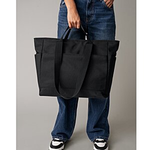 Additional Image 2 - a person holding a black bag