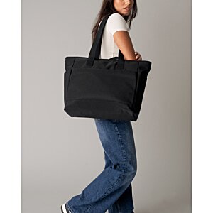 Additional Image 3 - a woman walking with a large black bag