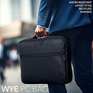 Additional Image 5 - a person holding a briefcase