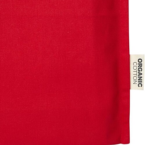 Additional Image 1 - a red rectangular object with a white label