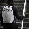 Additional Thumbnail Image 5 - a person with a backpack walking up stairs