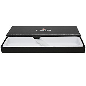 Additional Image 5 - a black box with a white lid