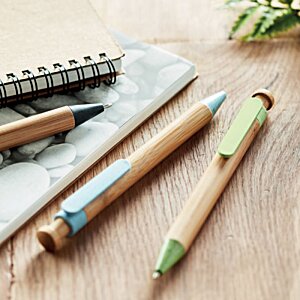 Additional Image 1 - a group of colored pencils on a table