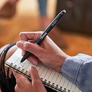 Additional Image 6 - a person holding a pen in a notebook