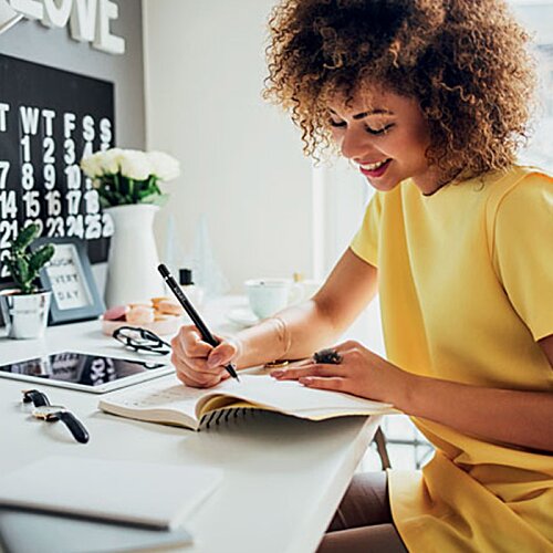 Additional Image 2 - a woman holding a phone