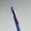 a close up of a blue pen