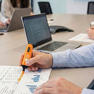 Additional Image 2 - a person holding an orange marker