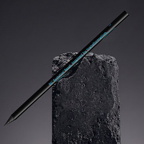 Additional Image 1 - a black and blue pencil on a rock