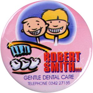 Additional Image 5 - a round pink sticker with cartoon characters