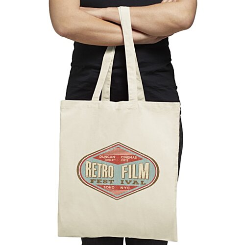 Additional Image 4 - a person holding a white bag