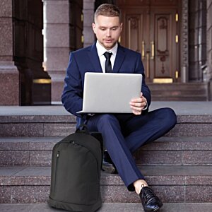 Additional Image 2 - a man sitting on stairs with a laptop