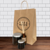 a brown bag with jars on a table