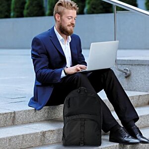 Additional Image 7 - a man sitting on steps using a laptop