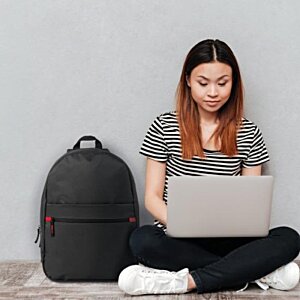 Additional Image 2 - a woman sitting cross legged with a laptop