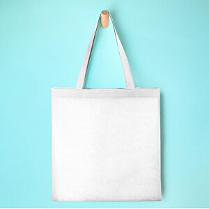 Additional Image 1 - a white bag on a blue wall