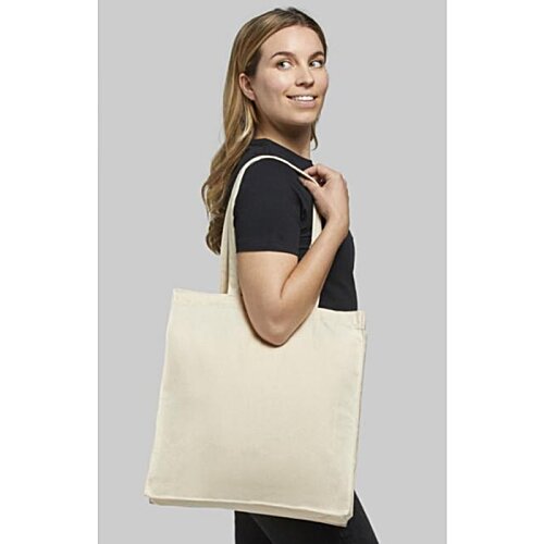 Additional Image 3 - a woman holding a white bag