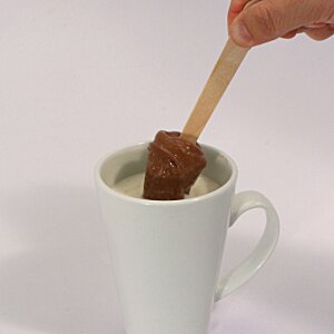 Additional Image 2 - a person holding a wooden spoon in a cup of milk