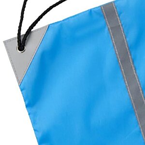 Additional Image 2 - a blue bag with a black strap