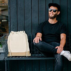 Additional Image 3 - a man sitting on a bench