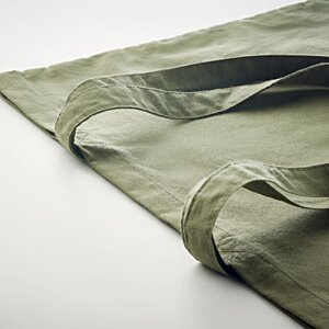 Additional Image 1 - a green bag on a white surface