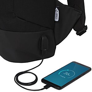 Additional Image 1 - a phone charging on a backpack