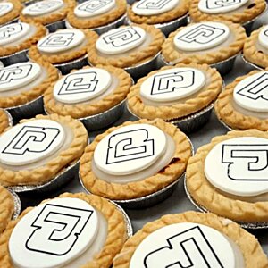 Additional Image 4 - a group of cookies with white frosting