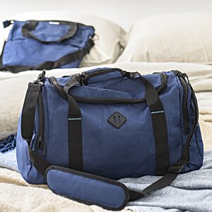Additional Image 8 - a blue duffel bag on a bed