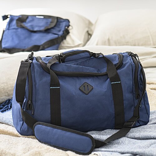Additional Image 8 - a blue duffel bag on a bed