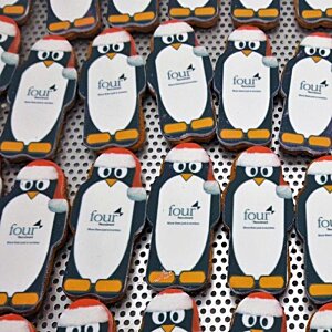 Additional Image 2 - a group of penguins on a table