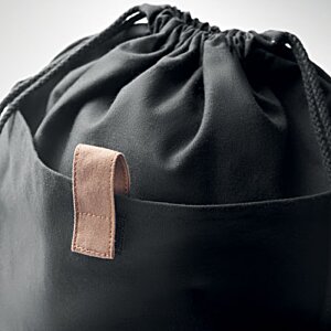 Additional Image 2 - a black bag with a brown tag