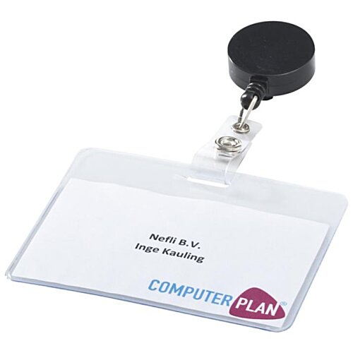 Additional Image 2 - a badge with a black round object