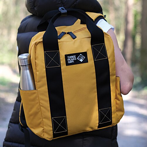 Additional Image 9 - a person carrying a backpack