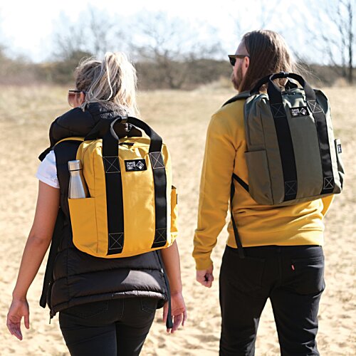 Additional Image 10 - a man and woman with backpacks walking in a field