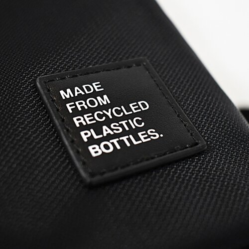 Additional Image 5 - a black label with white text