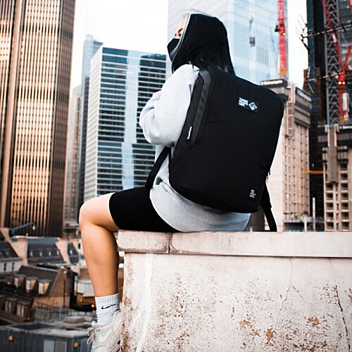 Additional Image 9 - a person sitting on a ledge