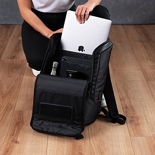 Additional Image 10 - a person putting a laptop in a backpack
