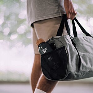 Additional Image 1 - a person carrying a bag