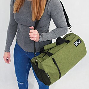 Additional Image 3 - a woman holding a green bag