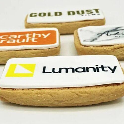 Additional Image 2 - a group of cookies with white frosting