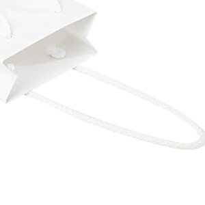 Additional Image 3 - a white object with a string
