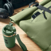 a green bag with a green cup and a black strap