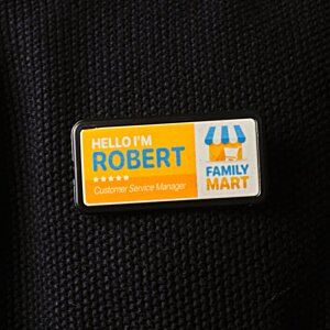 Additional Image 1 - a yellow and blue tag on a black shirt