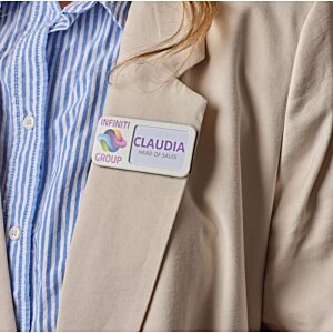 Additional Image 2 - a person wearing a jacket with a name tag