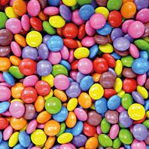 Additional Image 1 - a blurry image of a pile of candy