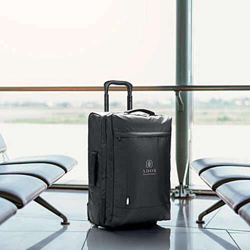 Additional Image 6 - a black suitcase in a room with chairs