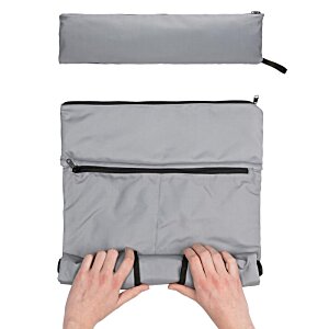 Additional Image 4 - a person's hands folding a grey bag