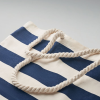 a blue and white striped bag