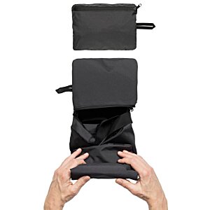 Additional Image 2 - a person holding a black object