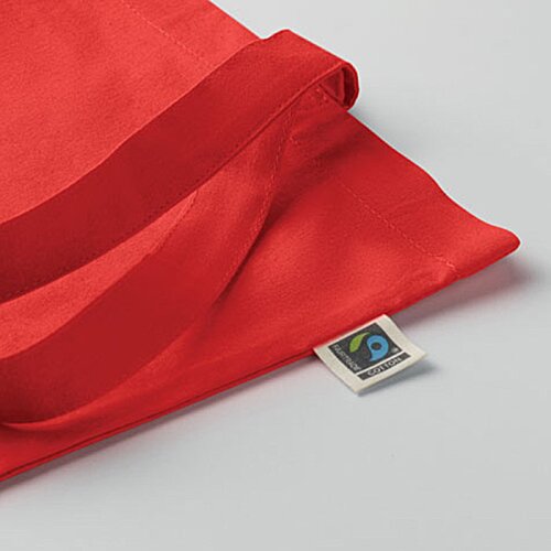 Additional Image 1 - a red cloth with a small object on it